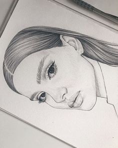 a pencil drawing of a girl with long hair