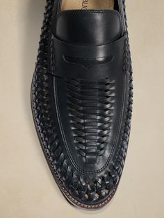 Luxury with a twist, this seasonal take on the classic penny loafer showcases an intricate weaving technique that adds a handsome touch of texture.  Designed with lightweight, durable OrthoLite® performance insoles for breathable cushioning that wic Penny Loafer, Penny Loafers, Weaving Techniques, Penny, Banana Republic, Black Leather, Loafers, Weaving, Twist