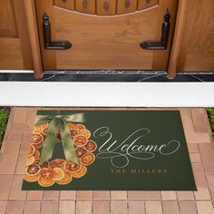 a welcome mat is on the front door