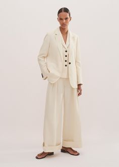 Tailored Tuxedo-style Pantsuit For Spring, Spring Tuxedo Style Tailored Pantsuit, Tailored Tuxedo Style Pantsuit For Spring, Spring Tuxedo Pantsuit For Business Casual, Tailored Wide Leg Spring Suits, Tailored Wide Leg Suits For Spring, Spring Tuxedo Style Pantsuit For Work, Spring Tuxedo Pantsuit For Work, Spring Tuxedo Pantsuit With Notch Lapel