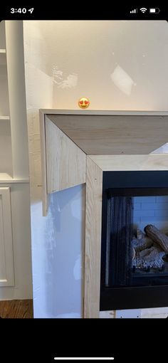 a fire place in the corner of a room