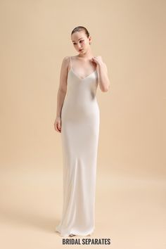 Handmade silk crepe by yours truly. Color :  Light Ivory Details:  Well-constructed double layer crepe silk Spaghetti straps  Deep V back matching the overlay back  Floor length  Zipper closing If you choose custom size, I will message you measurements guide later Shop other BRIDAL DRESSES : https://etsy.me/31l1Ipb Turnaround time: Due to the delicate nature of the handcrafted goods we produce this cover up has creation time of approximately 6-8 weeks  💕Exchange:  For items in standard sizes, I'm happy to accept exchange within 3 days of delivery. Buyers will be responsible for the new shipping fees.  For custom sizes, and custom orders, unfortunately I won't be able to accept exchange since they are made with your specific requirements.  💕Return:  For items in standard sizes, I'm happy Silk V-neck Slip Dress For Wedding, Silk V-neck Slip Dress For Wedding Night, Silk V-neck Slip Dress For Evening, Elegant Modal Satin Wedding Slip Dress, Modal Satin Maxi Length Slip Dress For Wedding, Modal Satin Maxi Slip Dress For Wedding, Elegant Silk Slip Dress For Wedding, Elegant Silk Slip Dress For Wedding Night, Elegant Silk Dress With Spaghetti Straps For Wedding