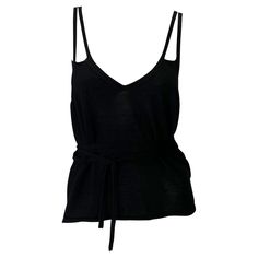 TheRealList presents: a black cashmere Gucci wrap-around tank top, designed by Tom Ford. From the late 1990s, this oh-so-soft tank top wraps around the body and features a v-shaped cut at the back, multiple straps, and a v-neckline. This never worn top is made complete with the original tags! This must-have top is the perfect piece to add to any Gucci by Tom Ford lover's collection! Follow us on Instagram! @_the_reallist_ Approximate measurements: Small 21.5" shoulder to hem Tom Ford Top, Gucci By Tom Ford, V Shape Cut, Knit Wrap, Wrap Around, V Shape, Tom Ford, Tank Top Shirt, Pretty Outfits