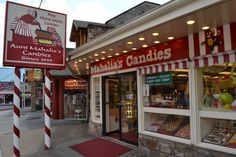 a store front with candy and candies on display