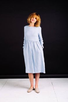 "Sky blue long sleeve linen dress. Long sleeve linen dress. Comfortable and feminine, perfect for all occasions and all seasons. Made from locally manufactured prewashed linen fabric and is perfect for all seasons. -------------------------------------------------------------------------------------------------------- DESCRIPTION: -Silhouette- - slightly loose fit body with full hand ruffled skirt - higher waist line - buttons opening at back side - long sleeves with buttoned cuff - dress length Midi Linen Dress, Velvet Shirt Dress, Garden Fashion, Blue Linen Dress, Sky Blue Dress, Marine Uniform, Long Linen Dress, Dress Handmade, Long Maxi Skirts