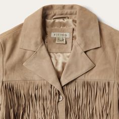 An iconic statement piece, this suede jacket made from high-grade leather features layers of fringe and Western details like stylized front patch pockets and a notched collar. Supple leather and quality craftsmanship will make this Western classic a closet go-to for years to come. Fully-Lined Notch Collar Straight Front Yokes with Fringe Single Point Back Yoke Front Patch Pockets With Fringe Fringed Sleeves and Bottom Hem Leather Imported Tan Suede Jacket, Fringe Leather Jacket, Suede Fringe Jacket, Casual Bottoms, Denim Boots, Denim Outerwear, Fringe Jacket, Notch Collar, Suede Fringe