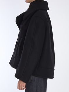 Short pea coat in black wool. It features padded shoulders, Ulster collar, double-breasted button closure and two side welt pockets. Silk lining. Oversized fit. Size nationality: FRGender: WomenMaterial: 100% WOOLColor: BlackMade in: ITProduct ID: 6377580 810508 Y080W 1000*Import tax/duty will be calculated at checkout (If applicable) Oversized Pea Coat, Black Wool Coat, Leather Cap, Pea Coat, Sweaters Knitwear, Black Wool, Womens Fall, Denim Top, Wool Coat