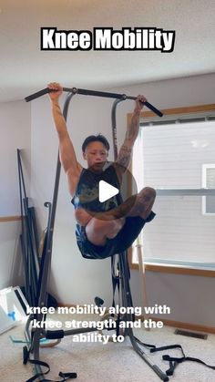 a man is doing an exercise on a pull up machine with the caption knee mobility