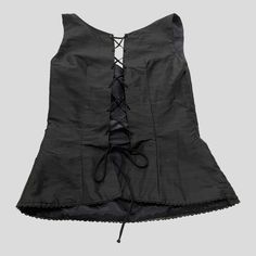 Corset Top in Black Silk Shantung.* This top has a beautiful scooped V neckline and the back has a lace up detail with metal eyelets and black silk spaghetti ties. This Corset top rests about 4 inches below the waist, is fully lined with special lace hem binding. See photo of Corset Top with 3 Tiered Skirt in Silk Chiffon. *last one! Size Small Shantung Silk, Lace Hem, Vintage Textiles, Tiered Skirt, Corset Dress, Silk Chiffon, Black Skirt, Silk Top, Corset Top