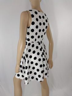 "Women's Dress Black White Polka Dot Classic Vintage by ALYA SIZE S Black and white LARGE polka dots sleeveless pull over dress with scoop neck. High quality. Excellent like new condition. Easy to wear casual chic vintage for the disco sporting life. MEASUREMENTS: Length - 32.5\" Bust (underarms to underarms) - 33-36\" Waist - 27\"unstretched Hips -22\"x2 MODEL STATS: Ht. - 5' 8.5\" Bust - 34\" Waist - 25\" Hips - 35\" *Please check measurements to ensure proper fit and remember to allow extra r Knee-length Polka Dot Sleeveless Summer Dress, Summer Polka Dot Sleeveless Knee-length Dress, Polka Dot Knee-length Sleeveless Dress For Spring, Polka Dot Sleeveless Daywear Dress, Polka Dot Sleeveless Summer Party Dress, Polka Dot Sleeveless Dress For Summer Party, Casual Polka Dot Sleeveless Party Dress, Casual Polka Dot Sleeveless Dress For Party, Fitted Polka Dot Sleeveless Dress For Spring