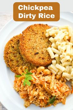 a white plate topped with meat, pasta and veggies