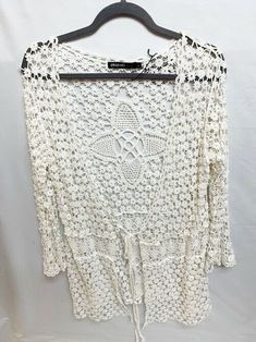 Women's Origami Jacket Cover Up  Open Crochet Weave  Tie Front  Long sleeve    32" L  Size Large New with Tag Summer Vacation Cardigan With Crochet Details, Summer Vacation Crochet Cardigan, White Cardigan For Beach Season, White Crochet Lace Cardigan For Summer, White Long Sleeve Cardigan For Beach Season, Summer Beach Cardigan With Crochet Trim, White Crochet Cardigan For Summer, Summer Long Sleeve Crochet Lace Cardigan, Summer Crochet Lace Long Sleeve Cardigan