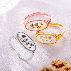 [RING OF COMMEMORATIVE VALUE]: Want a piece of beautiful flower that never fades to represent eternal love? This Personalized Birth Flower Ring is sure to be the one for you! It can be easily worn daily and has a commemorative value. Each kind of flower will bring you good luck and wishes.
[SYMBOLIC MEANING OF FLOWERS]: Each month has a symbolic flower whose characteristics may be "inherited" by anyone born in that month: January, Snowdrop - Admiration, Love, Hope, Rebirth / February, Oval Engraved Flower Ring For Anniversary, Dainty Oval Engraved Ring For Gift, Dainty Oval Engraved Ring As Gift, Dainty Oval Flower Ring For Gift, White Oval Engraved Ring Gift, Dainty Oval Flower Ring As Gift, White Oval Flower Ring Gift, Engraved Oval Cabochon Ring For Gift, Flower Shaped Ring With Birth Flower For Gift