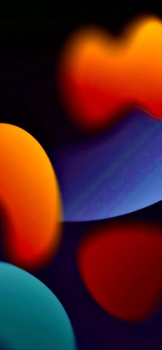 an abstract background with different colored circles in the dark blue, orange and red hues