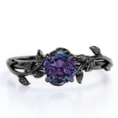 Soothe your soul with this 0.50 Carat - Round Cut Lab Created Alexandrite Ring - Leaf & Vine Engagement Ring - 18K Black Gold Plating Over Silver. Skillfully hand-cut into a nice round cut by our skilled jewelers, this alluring alexandrite gemstone ring combines 0.50 Carat alexandrite on solid rose gold plating over silver. Special and non-traditional, this alexandrite band is well-suited for those who are not quite into normal lifestyle. Reflective properties of this alexandrite ring will absol Obsidion Engagement Ring, Vampire Wedding Rings, Obsidian Ring Engagement, French Vampire, Darry Ring, Prong Setting Engagement Ring, Vampire Style, Milgrain Wedding Ring, Prong Engagement Rings