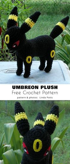 there is a crocheted black cat with yellow eyes