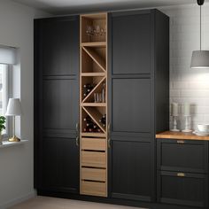 a tall cabinet with wine bottles in it