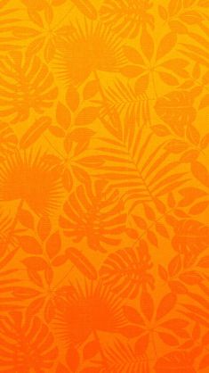 an orange and yellow background with lots of leaves on the bottom right hand corner, which appears to be very large