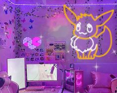 a room that has a laptop computer on the desk in front of it and a pokemon wallpaper