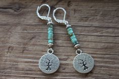 "Inspired by nature, these silver boho earrings have been made with small turquoise stones, antique silver plated round charms featuring a tree of life. They hang from sterling silver lever backs. Color : Genuine Turquoise ( blue green ) rondelle beads. Finish : Sterling Silver lever back, Sterling Silver head pins, Antique Silver Round Tree Charms ( Lead Free , Nickel Free ). Length: 2-1/4 inches including the sterling silver leverback. Ear wire : Sterling Silver lever back. Please keep in mind these are natural gemstones, each bead is unique and there will be slight variation in colors. Of course, I always do my best to match each pair you will receive making them unique. If you have any preference, more light blue turquoise, green turquoise, green brown turquoise ( with more matrix ), j Bohemian Dangle Earrings With Silver Beads, Bohemian Antique Silver Jewelry With Matching Earrings, Bohemian Antique Silver Jewelry, Nickel Free, Bohemian Antique Silver Jewelry Nickel Free, Bohemian Antique Silver Nickel-free Jewelry, Nickel-free Bohemian Antique Silver Jewelry, Antique Silver Bohemian Earrings, Lover Earrings, Women Nature