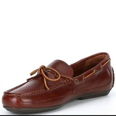 From Polo Ralph Lauren, The Men's Roberts Boat Style Leather Drivers Feature: Leather Upper Rawhide Laces Thread Through Metal Grommets At The Sides And Tie At The Vamp Rounded Toe Construction Slip-On Styling Cotton Lining Reinforced Heel Padded Leather Insole Rubber Nub Outsole Casual Leather Moc Toe Dress Shoes, Casual Leather Dress Shoes With Moc Toe, Casual Brown Dress Shoes With Leather Lining, Business Brown Boat Shoes With Leather Footbed, Casual Slip-on Leather Shoes With Goodyear Welt, Brown Leather Boat Shoes With Leather Footbed, Leather Boat Shoes With Rubber Sole For Business Casual, Masculine Leather Moccasins With Plain Toe, Business Casual Leather Boat Shoes With Leather Sole