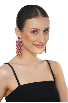 Beaded handmade earrings with Fringes Top attachment Jumpring with Back Pin Handcrafted in multi colour beads Get ready to shine with our enchanting Shakira Multi Color Beaded Earrings, a testament to exquisite craftsmanship and personal style. Each pair is meticulously handcrafted, weaving together a kaleidoscope of vibrant beads in mesmerizing shades of orange and blue. The delicate fringe sways with grace, adding a touch of sophistication and charm to any look.Designed for your comfort and co Traditional Beaded Earrings With Colorful Beads For Party, Traditional Colorful Beaded Earrings For Party, Chandelier Earrings With Faceted Round Beads, Beaded Multicolor Chandelier Earrings, Multicolor Beaded Chandelier Earrings, Multicolor Beaded Chandelier Earrings For Festive Occasions, Traditional Multicolor Beaded Earrings For Party, Traditional Multicolor Beaded Party Earrings, Festive Multicolor Beaded Chandelier Earrings