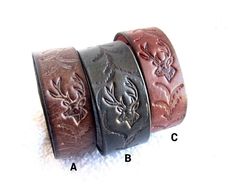 Unisex bracelet is made of genuine leather with embossed relief image of a deer head and ornaments. Adjustable wristband bracelet will be a great gift for him or for her. The deer is a symbol of spiritual authority and regeneration. In the Christian imagination, the deer is a symbol of piety, devotion and of God taking care of his children: men Bracelet width: 25 mm Wrist size range: 6.75-8 inches (17-20 cm) The size of the bracelet is adjustable by moving the screwback button stud in the desired hole (size range 6.75-8 inches (17-20 cm so if you do not know the exact size you can adjust it yourself. For all products are used only genuine high-quality Italian leather, natural stones and wood. All metal materials are lead and nickel free.  /Gift wrapping and packaging/ :   All items ordered Deer Bracelet, Gift For Him Valentines Day, Spiritual Authority, Leather Bangle, Art Deco Bracelet, Music Jewelry, Men Bracelet, Wristband Bracelet, Jewelry Care Instructions