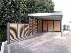 an empty garage with wooden slats on the sides