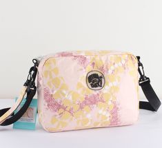 Embrace a touch of timeless elegance with the Dancing lei on pink Tyvek Crossbody Bag, a perfect fusion of sophistication and durability. Adorned with the iconic Lei pattern, this crossbody bag is not only a stylish accessory but also a practical companion for your daily excursions. ◾️Features◾️ Material: Tyvek - Water-Resistant and Durable: Crafted with Tyvek material, offering water-resistant properties and durability for long-lasting use. Dimensions (10.2"L x 7.5" H x 2" W): Ample size for ca Lei Purse, Wristlet Clutch, Simple Bags, Bag Travel, Pouch Bag, 3 In 1, Stylish Accessories, Beach Bag, Cross Body Handbags