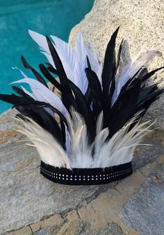 This handmade feather head crown is perfect to wear with your tribal outfit for any upcoming festival event.  Enchant them all with this feather crown featuring a suede band with rhinestones.  It is comfy, lightweight, and made with natural feathers. Height:10 inches from the base of the band to the top. One size fits all.  ༓❈ Made in USA ❈༓ Crown Black And White, Black And White Feather, Feather Crown, Indian Feathers, Head Crown, Crown Black, Diy Yarn Crafts, Feather Headband, White Feather