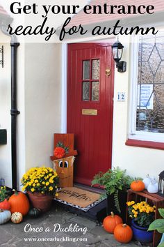 fall front porch decor with pumpkins and flowers on the steps, and an orange door that says get your entrance ready for autumn