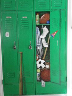 a green locker filled with lots of sports items