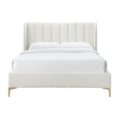 a bed with white linens and wooden legs on the headboard, against a white background