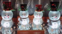 three snowmen with hats and scarves on their heads