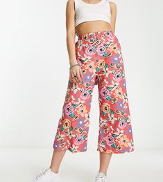 Pants & Leggings by ASOS MADE IN Collaboration with our partner SOKO Kenya Floral print High rise Elasticized waistband Cropped length Wide leg Stretch Red Floral Print Bottoms, Red Printed Bottoms For Spring, Pink Rose Print Summer Bottoms, Summer Pink Rose Print Bottoms, Pink Wide Leg Printed Bottoms, Pink Printed Wide Leg Bottoms, Pink Printed Wide-leg Bottoms, Casual Pink Floral Print Pants, Casual Pink Rose Print Bottoms