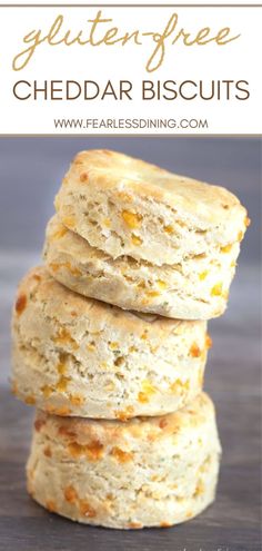 three biscuits stacked on top of each other with the words gluten free cheddar biscuits