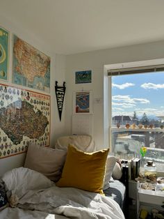 a bedroom with a map on the wall