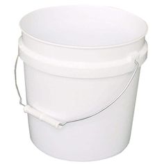 a white bucket with handle on the side