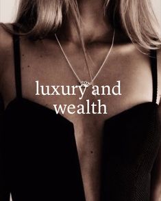 a woman wearing a black dress with the words luxury and wealth on it's chest