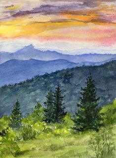 watercolor painting of mountains and trees at sunset