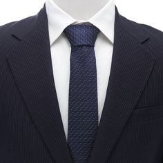 If your style aesthetic is traditional with a modern twist, then look no further. This elegant 100% silk tie is perfect for any formal occasion or workplace function, and combines a deep navy blue background with fine horizontal threads in contrasting shades of gray. Welcome to your new favorite accessory. Classic Striped Suit And Tie Accessories For Business, Classic Striped Ties For Business, Elegant Pinstripe Standard Tie, Elegant Ties For Business Meetings, Pinstripe Ties For Formal Occasions, Pinstripe Business Tie, Business Pinstripe Standard Tie, Striped Ties For Workwear, Classic Pinstripe Ties For Formal Occasions