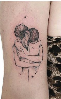 a couple hugging each other on the thigh