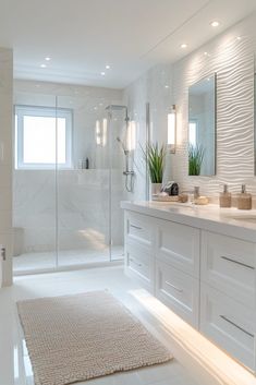 a white bathroom with two sinks, a shower and a large rug on the floor