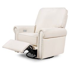 a white recliner chair with nail polishing on the armrests and foot rest