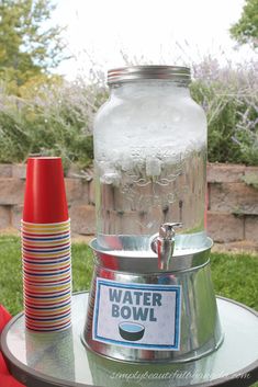 a water bowl sitting on top of a table