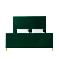 a green bed with two pillows on it's headboard and one pillow in the middle