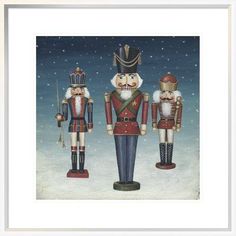 three nutcrackers are standing in the snow