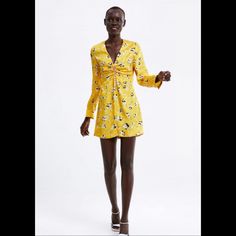 Adorable Rhinestone Buttoned Yellow Floral Dress Yellow Floral Print Mini Dress For Party, Yellow Long Sleeve Cocktail Dress, Yellow Long Sleeve Mini Dress For Cocktail, Zara Yellow Party Dress, Zara Yellow V-neck Mini Dress, Chic Yellow Zara Dress, Yellow Floral Print Dress For Date Night, Elegant Yellow Floral Print Mini Dress, Yellow Long Sleeve Dress For Date Night