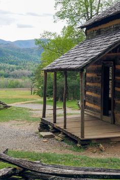 Photograph of a mountain cabin in Cades Cove, Tennessee. Blue sky and lush green trees. Tennessee Photography, Cades Cove Tennessee, Tennessee Travel, Mountain Background