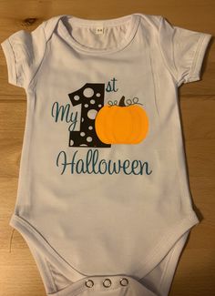 This cute onsie is custom made to order. All onesies will be white with pink, blue, orange or green lettering for the words. Name can be added under Halloween. Shirts are made to order, so no returns will be accepted. We pride ourselves on our work and strive to sell quality products. If you have any questions or concerns, please do not hesitate to contact us. Customizable White Bodysuit For Birthday, White Fun Style Onesie With Letter Print, Cute White Bodysuit For Halloween, Fun White Onesie With Letter Print, Fun White Short Sleeve Bodysuit, White Fun Onesie With Letter Print, White Short Sleeve Fun Bodysuit, Halloween Onsies, Cute Onesies For Halloween